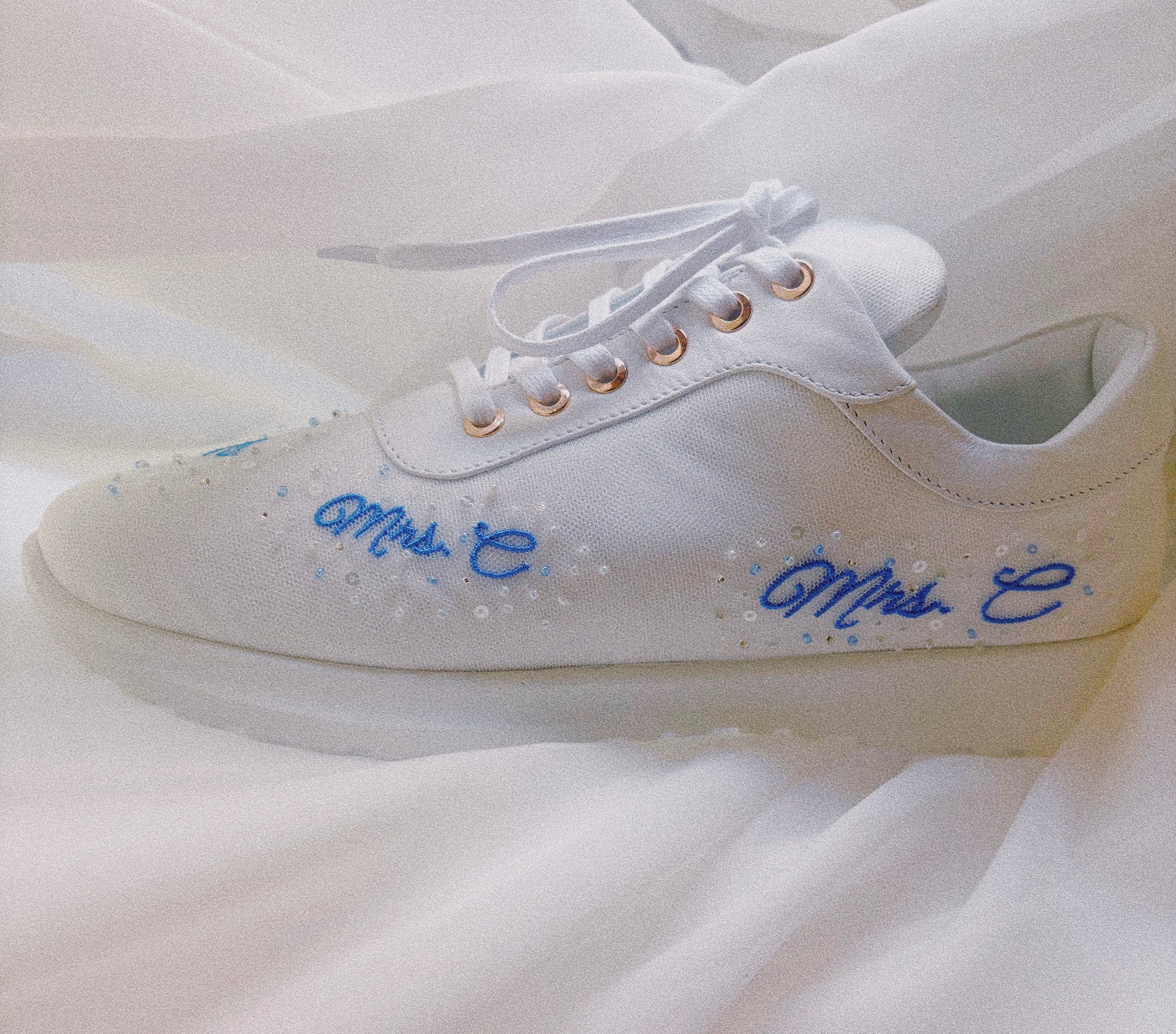Luxury wedding trainers for brides — personalized with blue thread and delicate beadwork